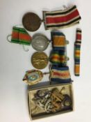 World War I pair to 32297 Pte W. Brown DLI and various cap badges