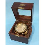 A 20th century German two day marine chronometer by Wempe, Hamburg, no. 203, bears label to mahogany