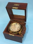 A 20th century German two day marine chronometer by Wempe, Hamburg, no. 203, bears label to mahogany