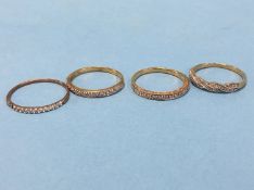 Four 9ct dress rings, 8.7 grams