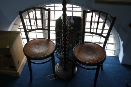 Pair of Bentwood chairs, a mirror and a standard lamp