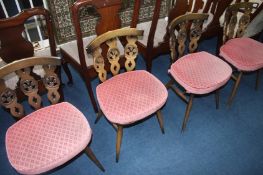 A set of four Ercol chairs