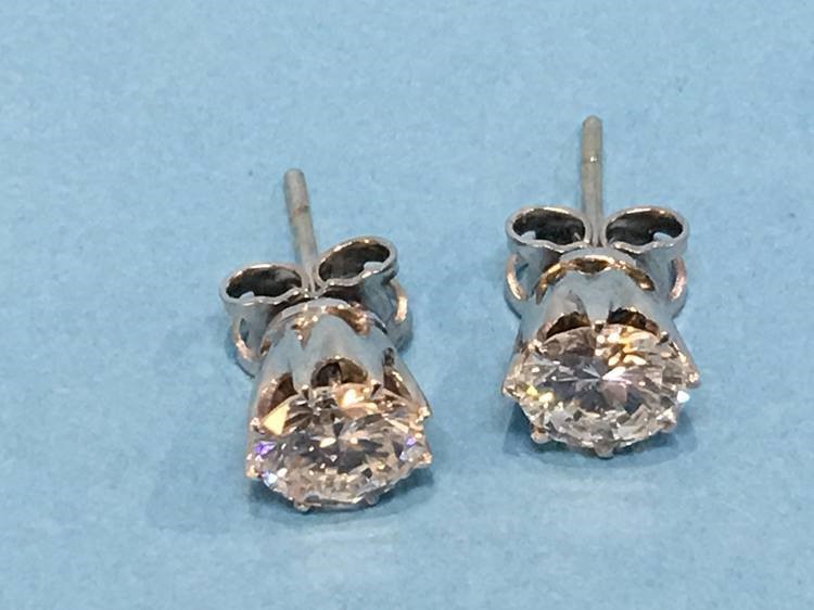 A pair of diamond earrings, each diamond approximately 1 carat - Image 8 of 17