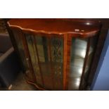 A walnut china cabinet