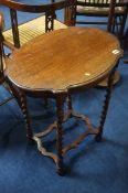 An oak oval barley twist table