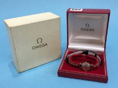 A Ladies 9ct gold watch, the dial signed Omega Ladymatic, with replacement 9ct gold bracelet and