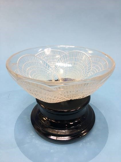 A Lalique 'Coquille' pattern bowl, stamped R. Lalique, number 3201. 21cm diameter