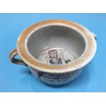 A Sunderland orange lustre two handled 'Frog' chamber pot 'Keep me clean and use me well and what