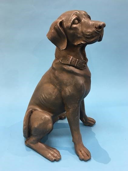 A model of a seated Dog