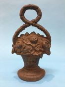 A cast iron door stop