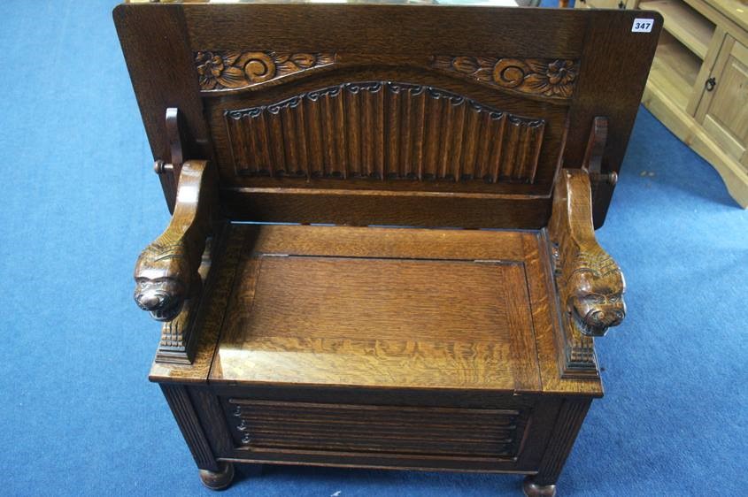 An oak linenfold Monk's bench, 90 cm wide