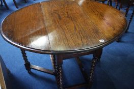 An oak barley twist gateleg table