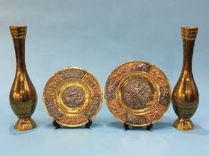 A pair of Indian vases and a pair of decorative Indian wall plates