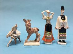 A Goldscheide model of a Zebra, a pair of Hungarian figures and a Lladro model of a seated ballerina