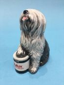 A Royal Doulton model of a Dulux dog