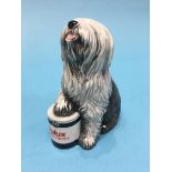 A Royal Doulton model of a Dulux dog