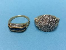 An 18k ring, 4 grams and a 9k ring, both mounted with diamonds, 4.7 grams,