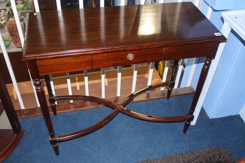 A reproduction mahogany side table