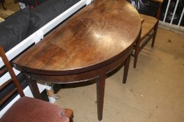 A 19th century mahogany demi-lune fold over tea table and two chairs