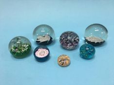 Seven paperweights, various