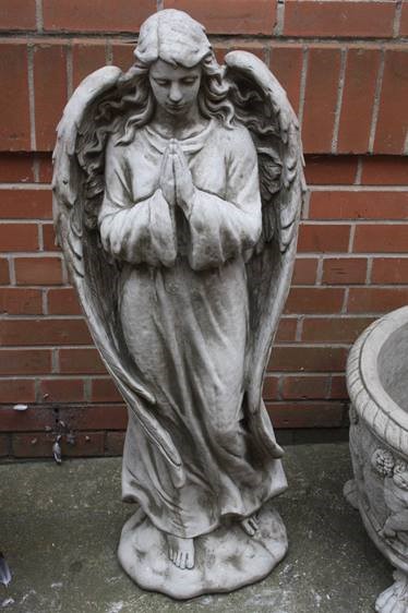 A garden statue of an Angel