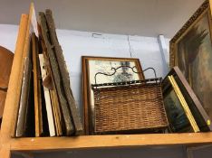 Assorted pictures and a magazine rack