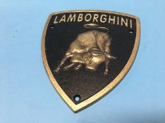 A 'Lamborghini' metal sign