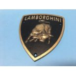 A 'Lamborghini' metal sign