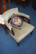 An Edwardian tub chair