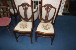 Pair of reproduction mahogany chairs