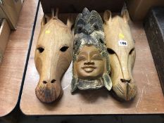 Carved wall masks