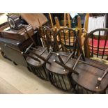 Oak table and six Ercol hoop back chairs