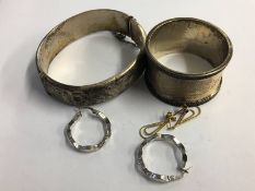 Pair of 9ct white gold earrings, silver napkin ring etc.