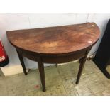 A 19th century half moon table