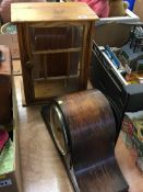 Mantle clock and a mini cabinet