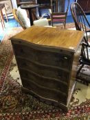 Walnut serpentine chest of drawers