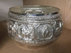 A Middle Eastern style white metal bowl