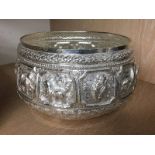A Middle Eastern style white metal bowl