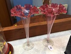 Pair of cranberry glass spill vases