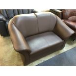 Brown two seater settee