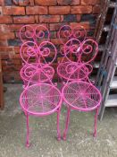 Four pink metalwork chairs