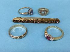 Two 9ct gold rings, weight 3.7 grams, a decorative bar brooch and two 9ct gold dress rings