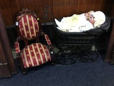 A Child's nursing chair and a doll's pram