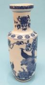 A Chinese blue and white vase decorated with birds, 32cm height