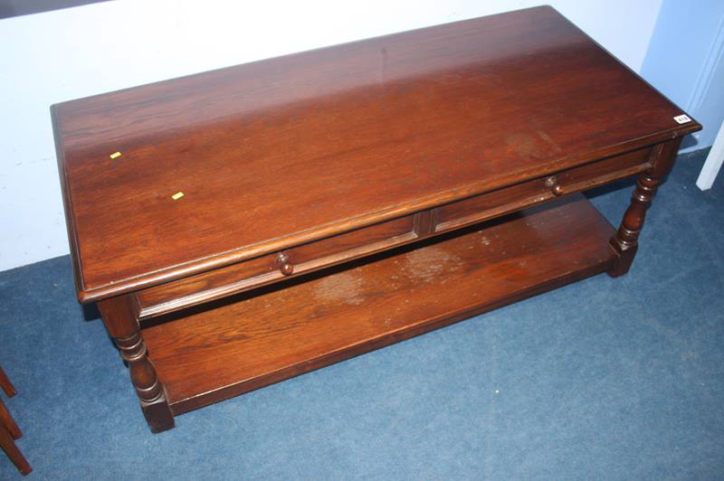 An oak two tier coffee table