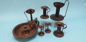 A collection of Gobery of Germany metalware, Arts and Crafts style chamber sticks and candlesticks