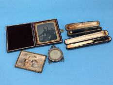 Various frames, a cigarette holder etc.