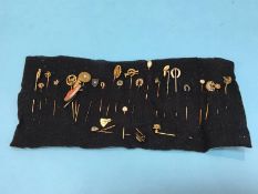 A collection of 29 various stick pins, 9ct gold, some mounted with seed pearls etc.