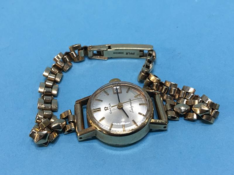 A ladies 9ct gold wristwatch, the dial signed Omega, Ladymatic, with boxes and paperwork, total - Image 3 of 3