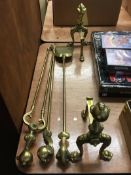 Set of brass fire irons and dogs